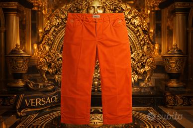 Pantaloni arancioni Versace