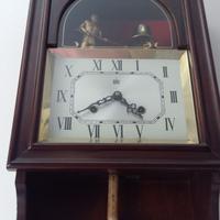 Orologio a pendolo da muro