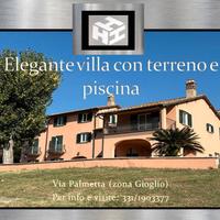 Elegante villa con terreno e piscina