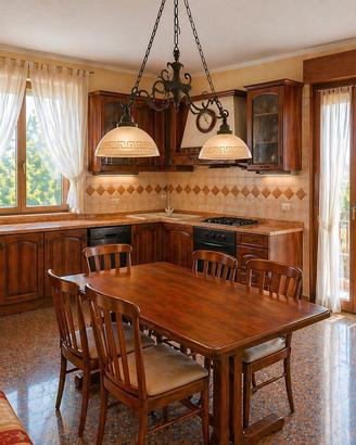 Appartamento con giardino,cantina e garage