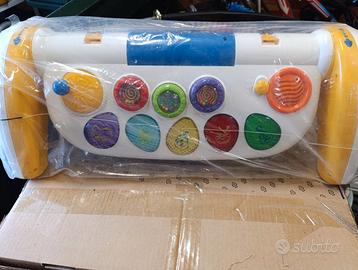 Girello Chicco con Centro Attività Musicale