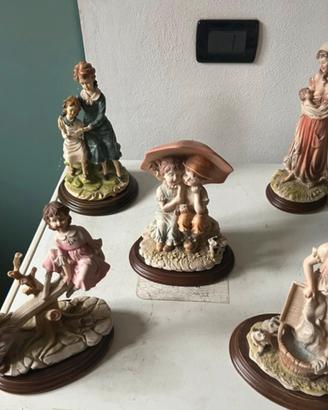 Per collezionisti :Set di 5 statue