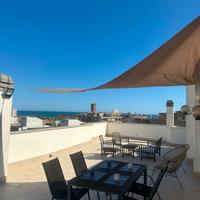 Attico centrale con terrazzo e posto auto