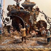 Presepe Natale. Borgo con fontana,natività,pastori