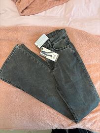 Pantaloni grigi a zampa d’elefante Calzedonia