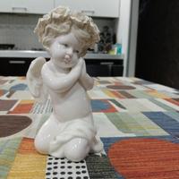 statuina in porcellana