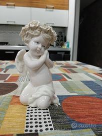 statuina in porcellana