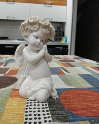 statuina in porcellana