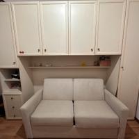 Stanzina con divano letto beige