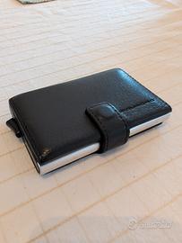 Portafoglio e portacarte in pelle Piquadro