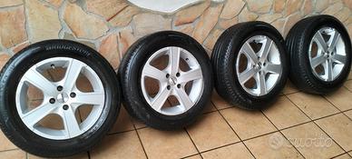 4 Cerchi in Lega Momo + 4 Ruote