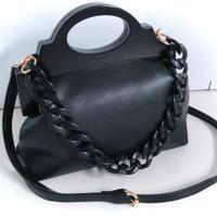 Borsa Clutch in ecopelle Intrend, manico legno