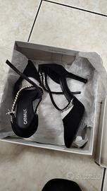 Tacchi catwalk nero Ed argento