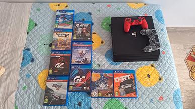 PS4 + 2 controller + tanti giochi
