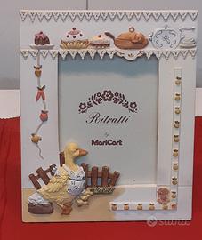 cornicetta NUOVA con decorazioni in rilievo