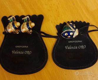 Set collezione bigiotteria orecchini e spilla