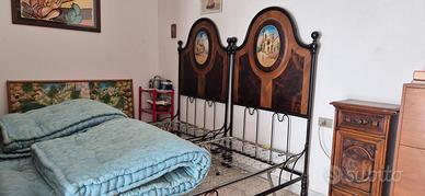 Antico letto matrimoniale 