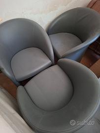 set 4 poltrone in pelle e tavolino