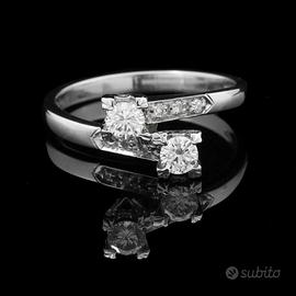 ANELLO CONTRARIE' IN ORO BIANCO 18 KT 750