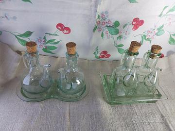 2 set ampolline olio/aceto vetro soffiato+vassoini