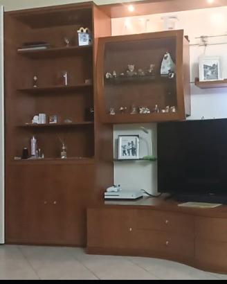 parete attrezzata ciliegio con porta scorrevole e 