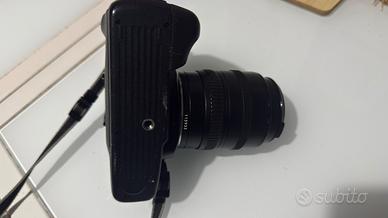 CANON Eos 750QD  REFLEX A RULLINO