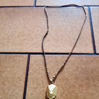 Collana in oro, leone