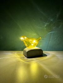 Luce decorativa in vetro