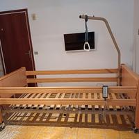 letto elettrico con ruote e sponde 