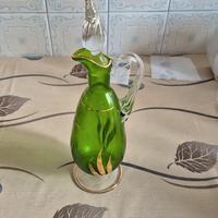 Bottiglia antica di vetro pregiato colorato