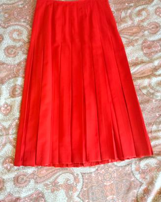 Gonna rossa a pieghe