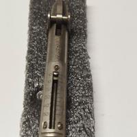 Antico Calibro a Molla