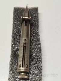 Antico Calibro a Molla