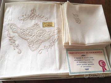 Tovaglia rotonda colore panna in puro lino con ric