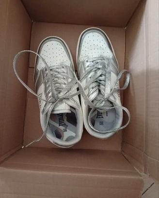 👟 Sneakers bianche con dettagli argento 👟