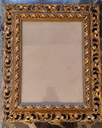 Cornice in legno dorata 