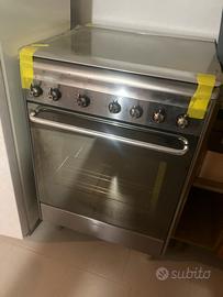Cucina 4 fuochi forno ventilato Smeg