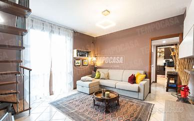 Elegante Appartamento di 3 Locali su Due Livelli a