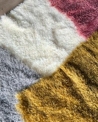 Tappetini( coperte) della pecora riccia