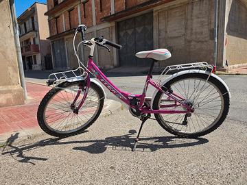 Bici bambina 24” Trek rosa + portapacchi + cavalle