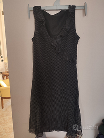 Vestito nero a pois bianchi