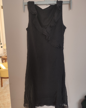 Vestito nero a pois bianchi