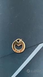 Pendente vintage dorato con intaglio geometrico