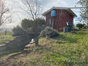 Terreno con fabbricato