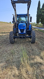 Trattore più caricatore con forche