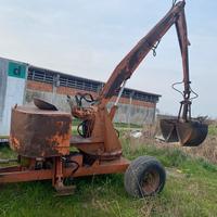 Trattore carica letame