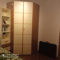 Cabina armadio angolare con libreria 