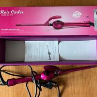 Ferro arricciacapelli (hair curler)