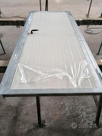 Porta a battente coibentata con pannello sandwich