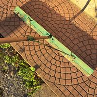 Rastrello livellatore per terriccio o sabbia